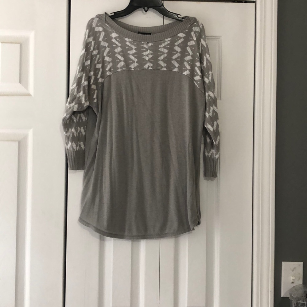 Grey sweater with white pattern